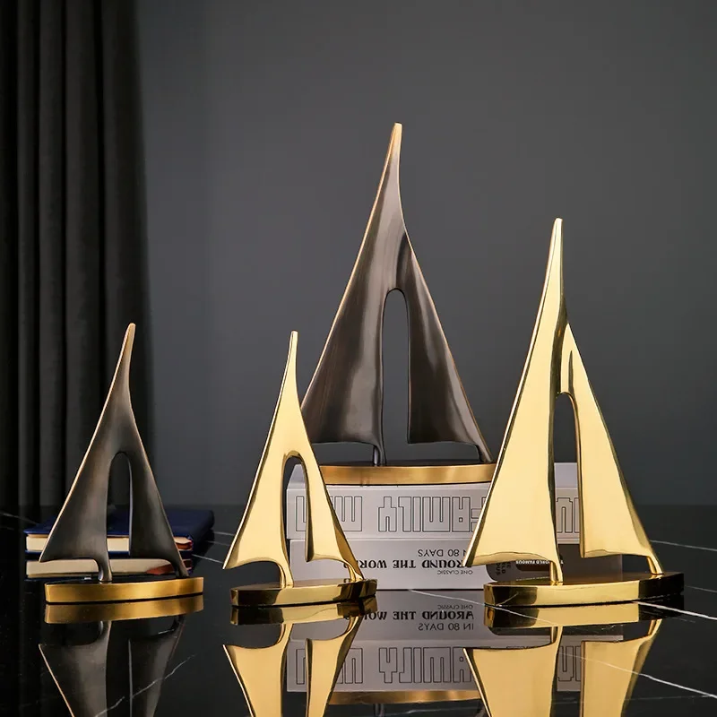 Golden Sailboat Sculpture